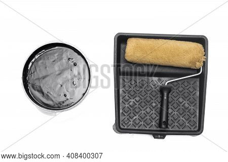 Paint Roller, Cuvette And Jar With A Black Paint Isolated On The White Background.
