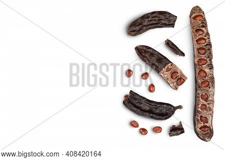 Ripe Carob Pods And Bean Isolated On White Background With Clipping Path. Top View With Copy Space F