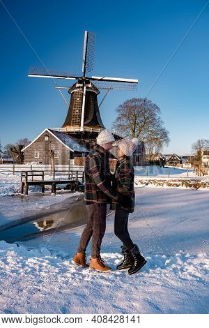 Pelmolen Ter Horst, Rijssen Covered In A Snowy Landscape Overijssel Netherlands, Historical Wind Mil