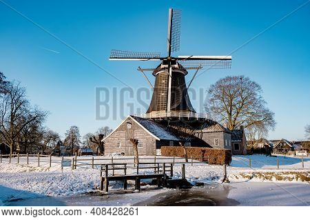 Pelmolen Ter Horst, Rijssen Covered In Snowy Landscape In Overijssel Netherlands, Historical Wind Mi