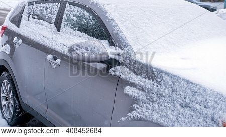 Is The Crossover Covered In Snow, The Car Was Covered With Wet Snow Close-up, The Passenger Car Was 