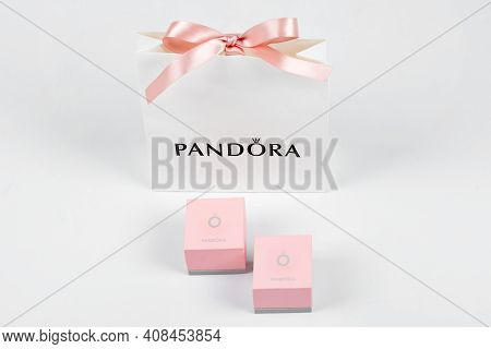 Kyiv, Ukraine - February 11, 2021: Pandora Paper Bag With Pink Bow And Pink Boxes. Famous For Its Br