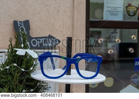 Timisoara, Romania - January 04, 2020: Big Blue Glasses On A Table For Novum Optika