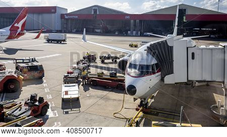 Melbourne, Australia - May 18, 2019: Airplane Docked Onto A Jetway At The Melbourne Domestic Airport
