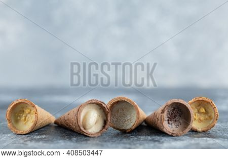 Close Up Photo Different Kinds Sweet Conus Candies On Grey Background