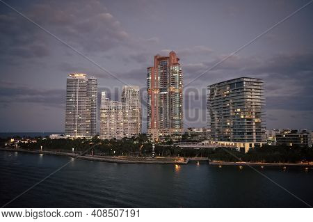 City Is Falling Asleep. Nightlife Concept. Cityscape After Sunset. Modern Skyscrapers. Visual Appear