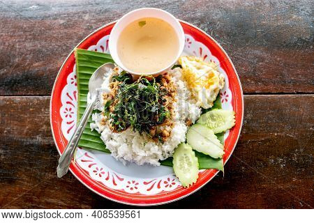 Rice Topped With Fried Pork, Basil, And A Fried Egg Fried Stir Basil Tray The Famous Dish Of Thai Pe