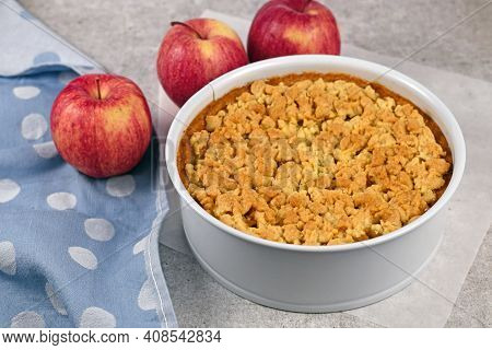 Whole Traditional European Apple Pie With Topping Crumbles In White Springform Pan
