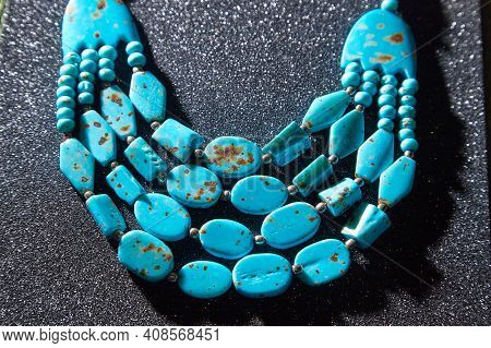 Beautiful Blue Beads. The Concept Of A Beautiful, Elegant Life And Beautiful Decoration For Woman