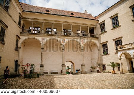 Renaissance Chateau Rebuilding Of Original Gothic Castle With Arcade In Courtyard, Colorful Historic