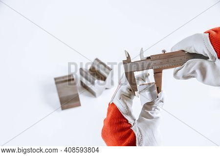 Measuring Inner Diameter, Outer Diameter, Length With A Caliper On A White Background. Measurement A