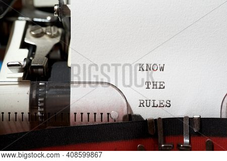 Know the rules phrase written with a typewriter.