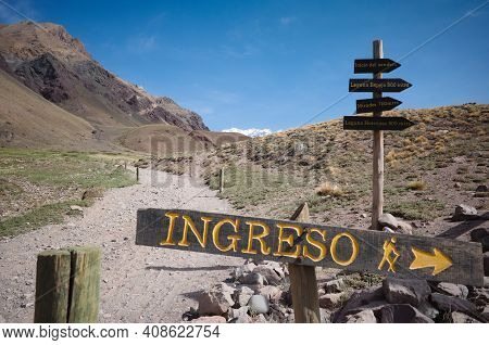 Directional Sign With Arrow Pointing Where Is Entrance On Hiking Trail In Aconcagua National Park, A