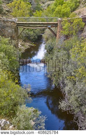 Antique Slate Stone Bridge Over Jarama River. Roblelacasa, Guadajara. Spain