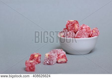 A Bowl Of Rahat Lakoum Isolated On Gray Background Horizontal Image. Turkish Sweet Concept