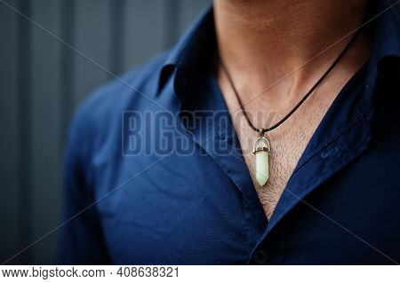 Close Up Hexagon Point Quartz Pendant At Man.