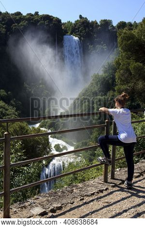 Terni (tr), Italy - May 10, 2016: A Girl Looks The Famous Marmore Waterfall, Terni, Umbria, Italy
