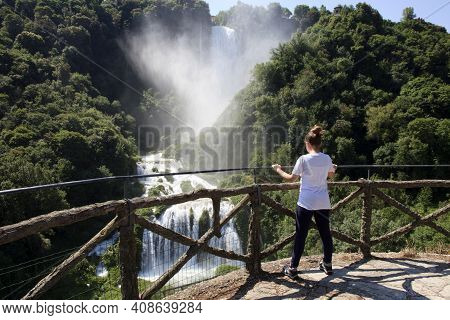 Terni (tr), Italy - May 10, 2016: A Girl Looks The Famous Marmore Waterfall, Terni, Umbria, Italy
