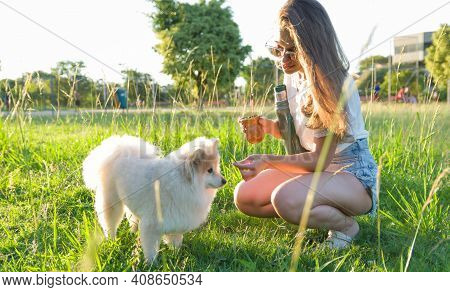 Blonde Woman Taking Traditional Gaucho Chimarrao
