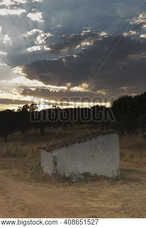 Water Well Of An Old Farm In The Middle Of The Countryside Of The Sierra Of Cordoba Andalusia At Sun