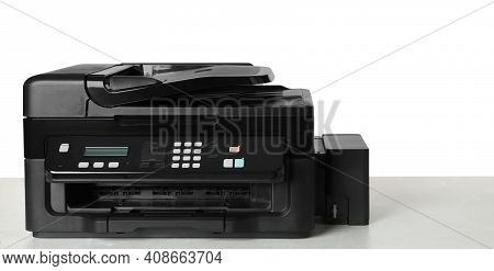 New Modern Multifunction Printer On Light Table