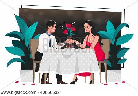 Young Couple Enjoying A Romantic Dinner Date Seated At A Table With Flowers Holding Hands Conceptual