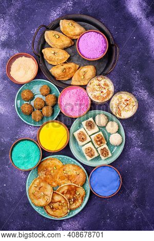 Food For Indian Holi Party. Laddu, Gujiya, Puran Poly, Thandai, Malpua And Burfi