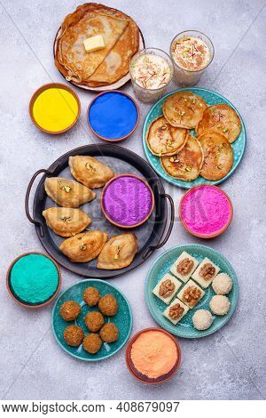 Food For Indian Holi Party. Laddu, Gujiya, Puran Poly, Thandai, Malpua And Burfi