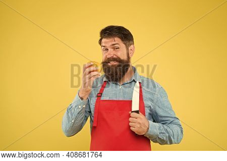 Chef Prepares Meal. Bearded Man Prepare Tomato. Fresh Salad Recipe. Mature Man Hold Knife And Vegeta