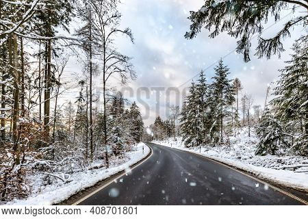 Snowy Winter Street Sourround Wood In Germany