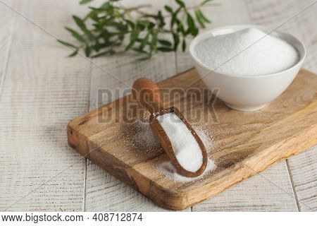 Natural Sweetener In A Wooden Spoon. Sugar Substitute. Erythritol