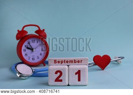September 21. Day 21th Of Month, Calendar Date White Wooden Calendar Blocks With Date, Clock And Ste