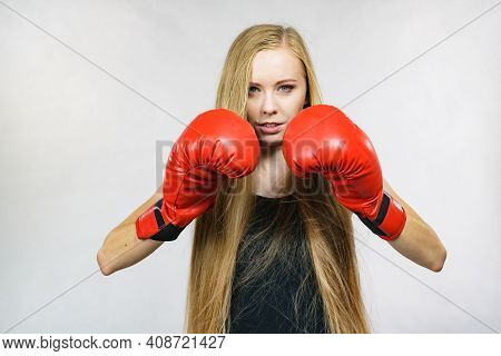 Girl In Red Gloves Playing Sports Boxing