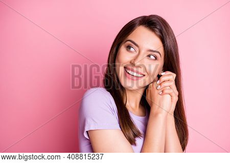 Photo Portrait Of Cute Lovely Girl Keeping Hands Near Cheekbones Smiling Looking At Empty Space Isol