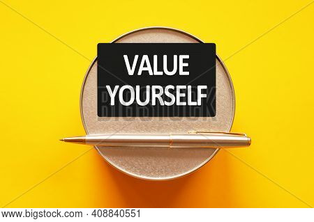 Value Yourself - Words Writing A White Letters On A Sheet Paper. Black Card With Text On A Yellow Ba