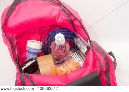 Close Up Disaster Prevention Goods In A Pink Rucksack