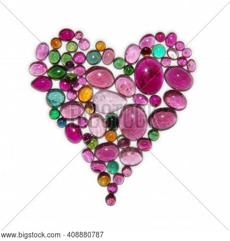 Heart Of Many Different Colors Tourmaline Cabochons On White Background