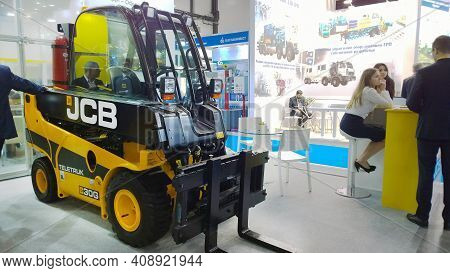 St. Petersburg, Russia - October 1, 2019: Telescopic Counterbalance Forklift Jcb Teletruk 30g At Inn