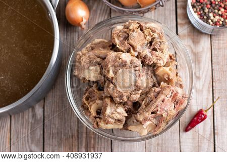 Beef Bones To Make Homemade Bone Broth For A Healthy Diet. Saucepan With Bone Broth. Top View