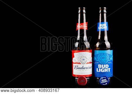 Sandhurst, United Kingdom; February 16th 2021:- Two Open Bottles Of Bud Light & Budweiser  With Lids