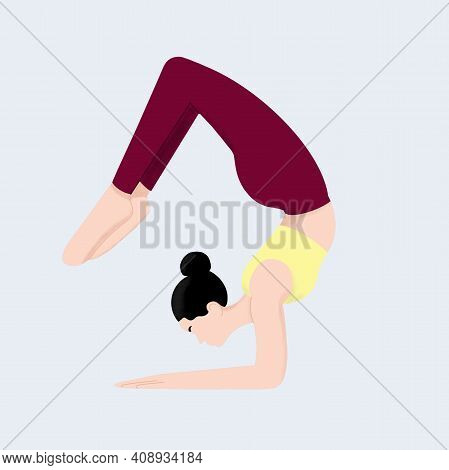 A Young Woman In Red Pants Does Yoga
