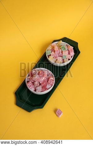 Two Bowls Of Rahat Lakoum On A Tray Isolated On Yellow Background Flat Lay. Turkish Sweet Concept. I