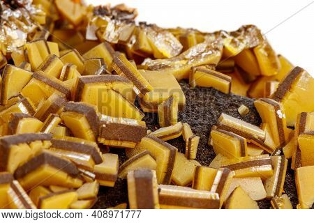 Macro Mineral Stone Yellow Wulfenite On A White Background