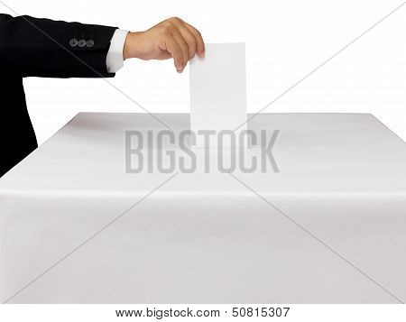 Gentleman Hand Putting A Voting Ballot In Slot Of White Box Isolated On White