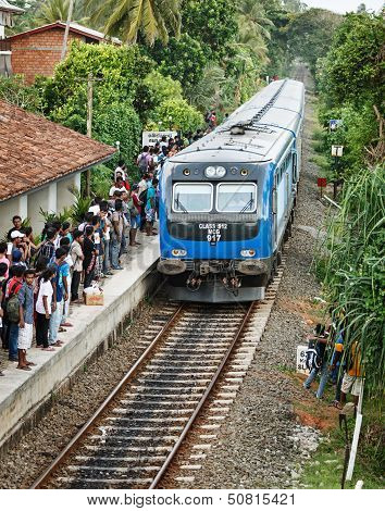 Train Arrive To Station With People On Apr 28, 2013 In Bentota, Sri Lanka