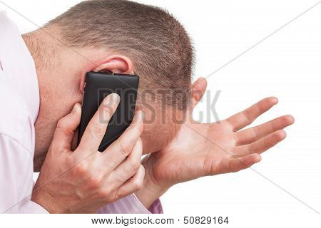 Frustrated Man Talking On The Phone