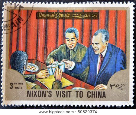Umm Al Qiwain - Circa 1966: A Stamp Printed In Uaq Shows Nixon?s Visit To China, Circa 1966