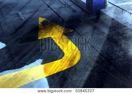 Arrow Sign in a Parking Lot