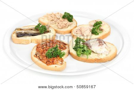 Tasty sandwiches with tuna and cod liver sardines different kinds of canned fish, isolated on white