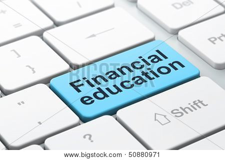 Education concept: Financial Education on computer keyboard back